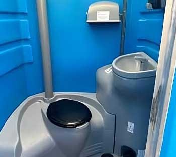 Close Door of 6 Pan Inside Portable Toilet — Two-Station Standard in Hunter Valley, NSW